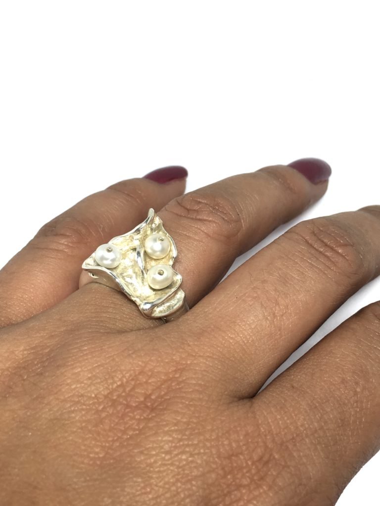 anel nicho de pérolas