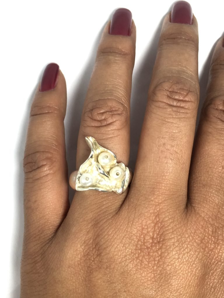 anel nicho de pérolas